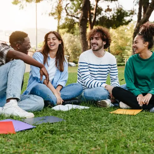 university-student-friends-sitting-on-the-grass-talking-in-the-college-campus-african.jpg_s1024x1024wisk20caHTY-wjLxmIxZS7ZMJmgcWSOu7RF2-yXPFTnv8zkPDU